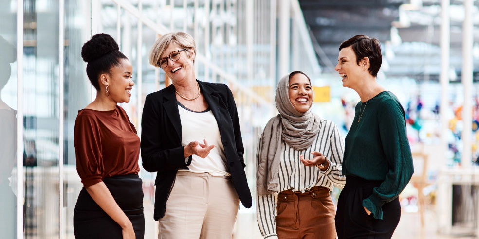 Informal gathering of smiling team members.